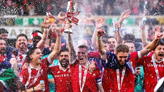 Wrexham players celebrate promotion