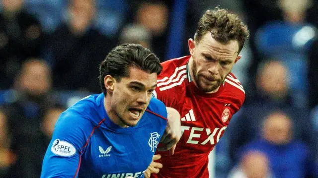 Rangers Ianis Hagi and Aberdeen's Nicky Devlin