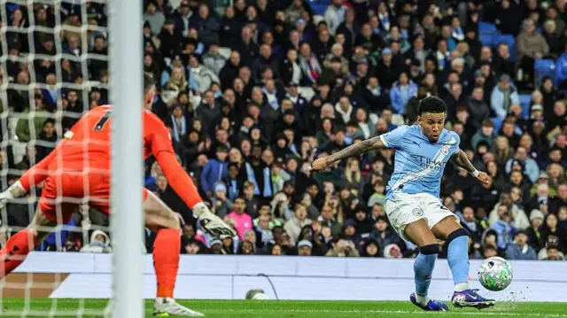 Savino of Manchester City scores