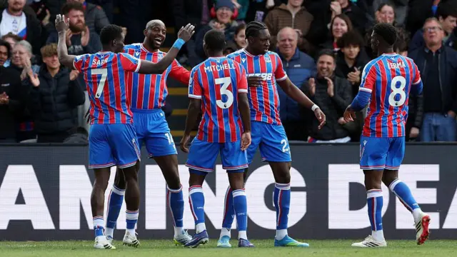 Jean-Philippe Mateta celebrates with his teammates