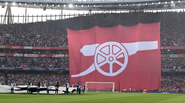 Arsenal flag in front of stand at Emirates Stadium