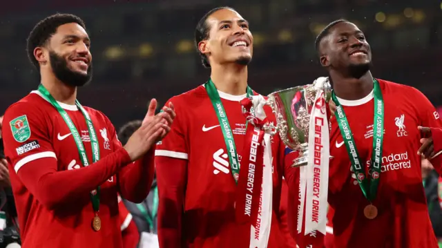 Liverpool players celebrate winning the Carabao Cup