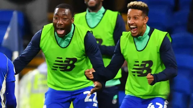 Yakou Meite and Callum Robinson celebrate Karlan Grant scoring for Cardiff