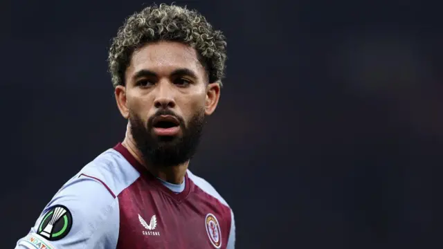 Douglas Luiz looks on for Aston Villa