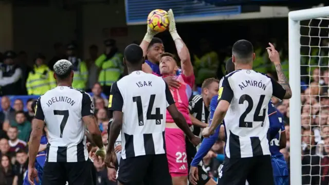 Nick Pope saves the ball