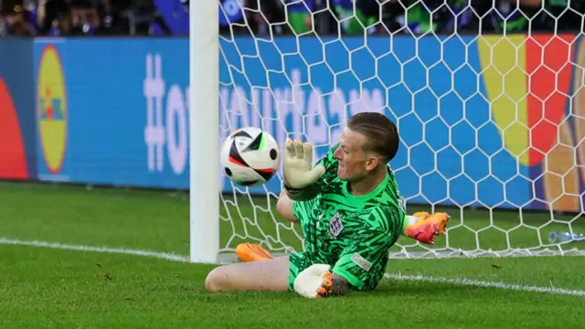 Jordan Pickford of England saves a penalty