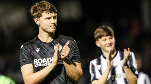 St Mirren captain Mark O'Hara applauds the fans