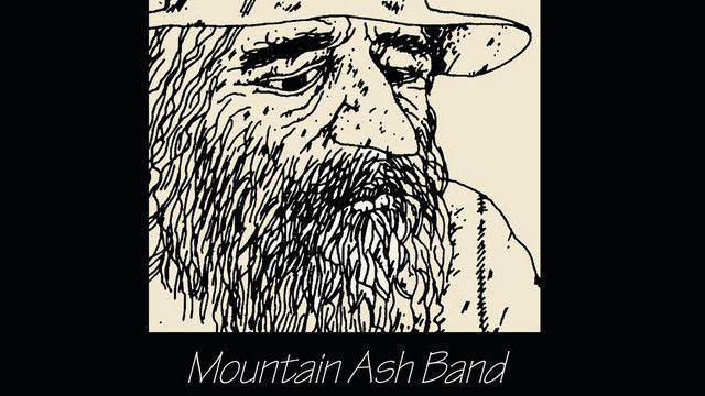 A black and white sketch of a scruffy, long-bearded old man, on a black background, with the words 'The Hermit' and 'Mountain Ash Band' showing it's album cover art.