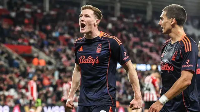 Elliot Anderson celebrates