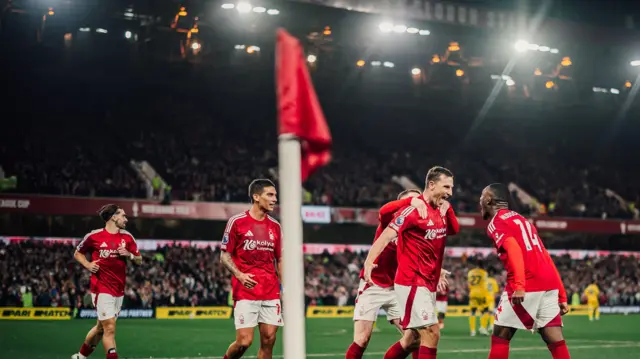 Nottingham Forest players, including Chris Wood and Callum Hudson-Odoi, celebrate their winner over Crystal Palace