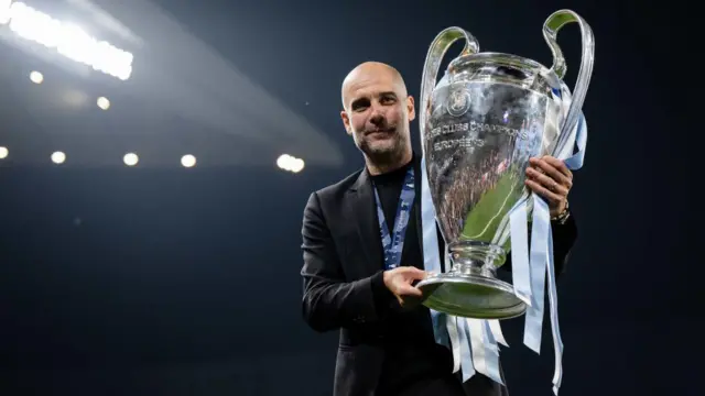 Pep Guardiola with Champions League trophy