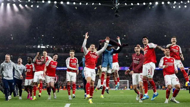 Arsenal players celebrate their Champions League semi-final 