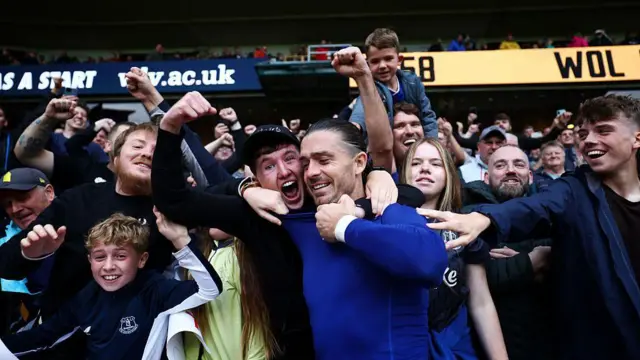Jack Grealish celebrating with Everton fans