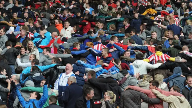 Sunderland fans celebrate by doing the Poznan