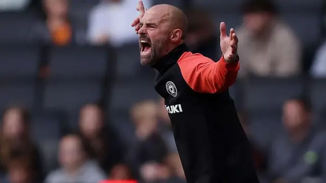MK Dons boss Paul Warne shouts at his team