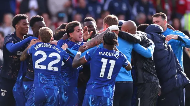 Chelsea team celebrate after win