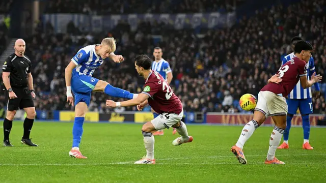 Jan Paul van Hecke has a shot blocked by Mateus Fernandes