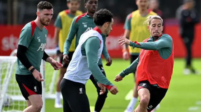 Andy Robertson and Kostas Tsimikas during Liverpool training