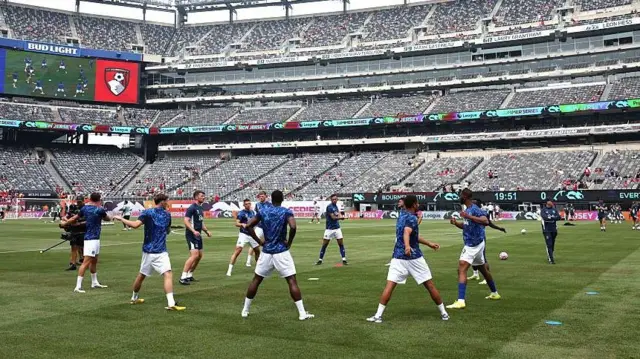 Everton players warm up ahead of a match against Bournemouth