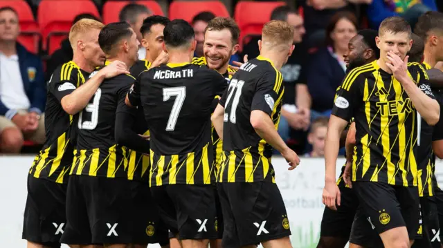 Aberdeen players celebrate