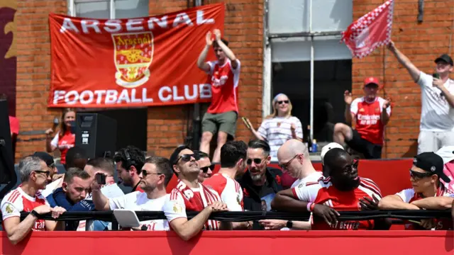 Mikel Arteta on the open top bus