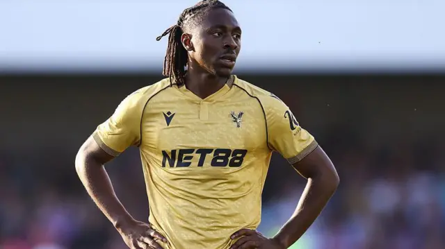 Eberechi Eze has his hands on his hips
