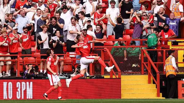 Lloyd Jones of Charlton Athletic celebrates a goal against Derby County in front of home fans at The Valley.