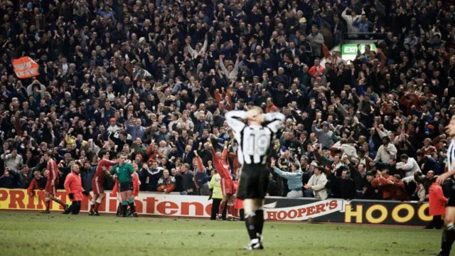 Despair for Newcastle United defender Steve Watson as Liverpool forward Stan Collymore celebrates his dramatic last minute winner