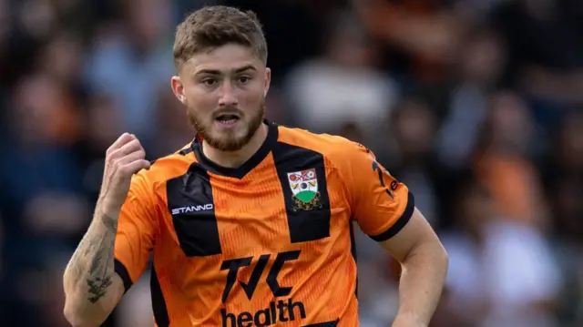 Scott High in action for Barnet