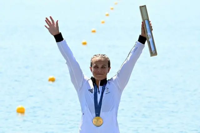 Lisa Carrington celebrates winning her third gold medal at Paris 2024