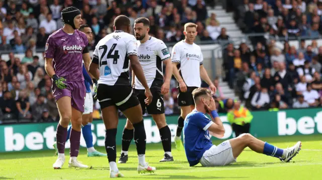 Dimitrios Goutas shows his disappointment at Derby