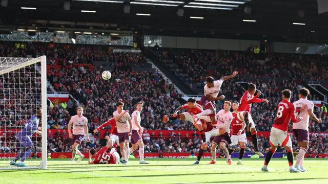 Ethan Pinnock scoring a goal for Brentford