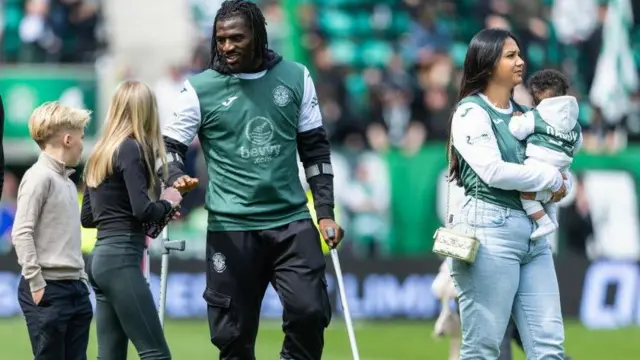 Hibernian's Rocky Bushiri in a boot at full time during a William Hill Premiership match between Hibernian and Motherwell at Easter Road