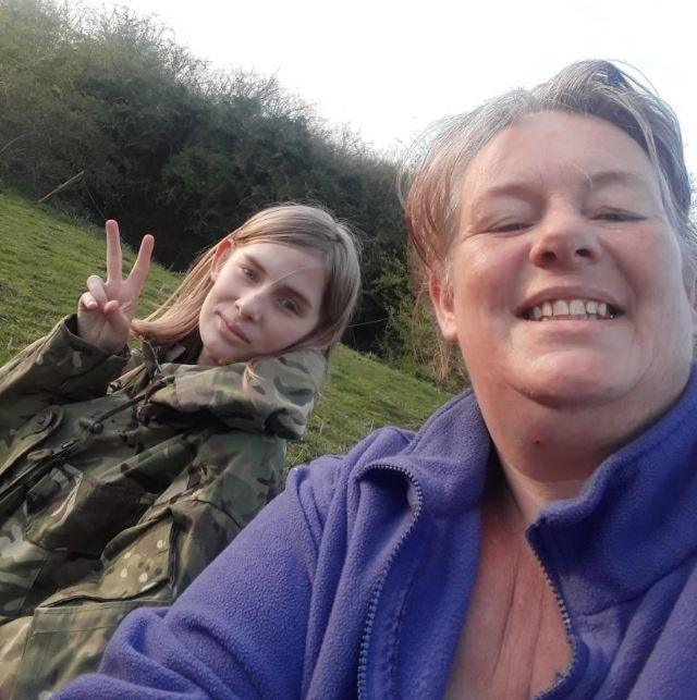 Emily Carter on the right wearing a purple fleece and Rhianan on the left wearing army camouflage