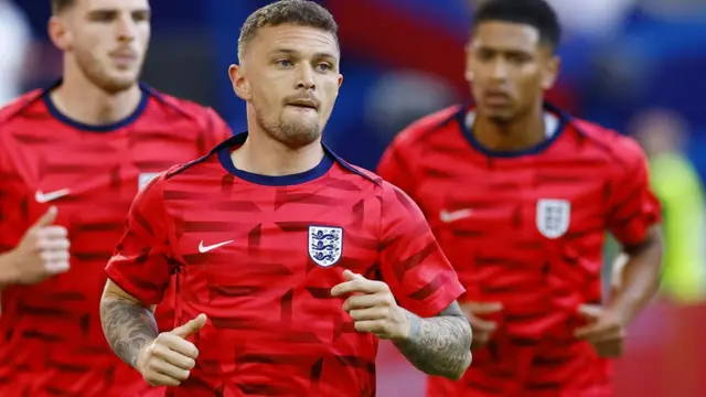 Kieran Trippier warms up before an England match