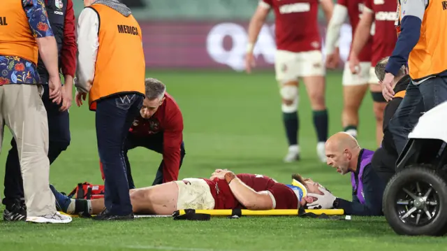 Luke Cowan-Dickie receives treatment