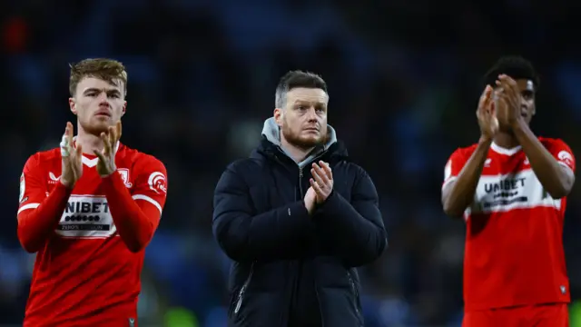 Tommy Conway (left), Kim Hellberg (centre) and Adilson Malanda (right) clap Middlesbrough fans at the end of the loss to Coventry