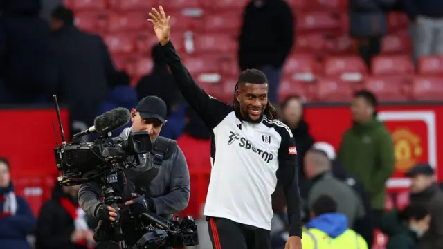 Alex Iwobi celebrates post-match