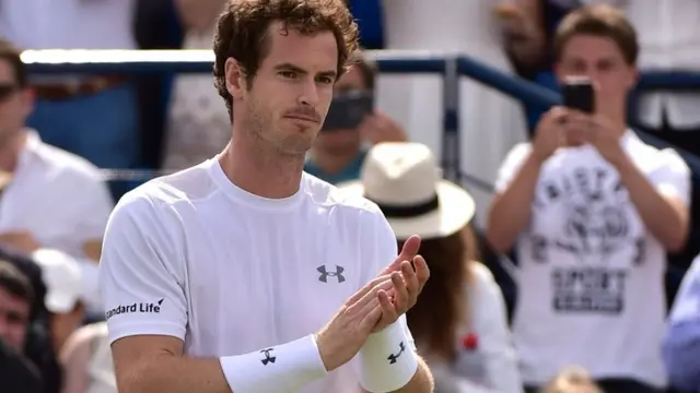 Andy Murray applauds after winning his match