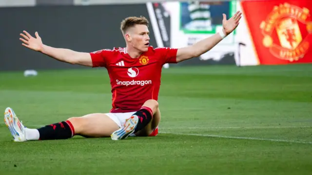 Scott McTominay arms out