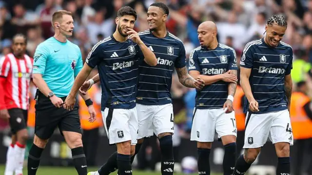 Marco Asensio and his Aston Villa team-mates