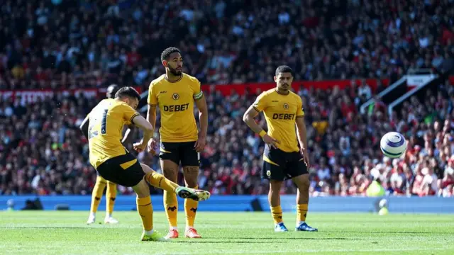Pablo Sarabia of Wolverhampton Wanderers scores his team's first goal agasint Manchester United