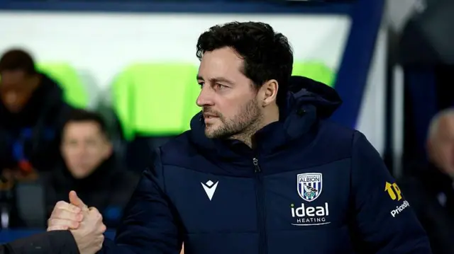Ryan Mason handshaking Julien Stephan before West Bromwich Albion versus Queen's Park Rangers began