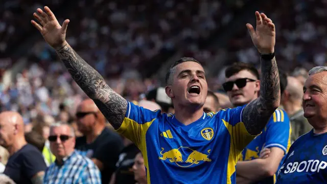 A Leeds United fan cheers