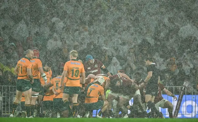 The weather was a big factor in the half, the Wallabies in control and showing slick handling skills in torrential rain
