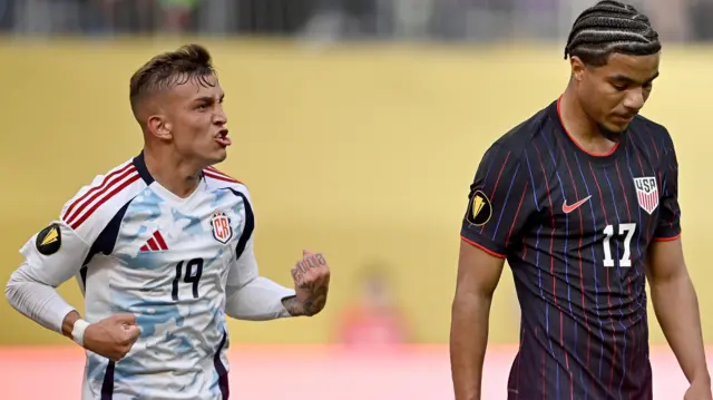 Kenneth Vargas (left) celebrates with Costa Rica against United States