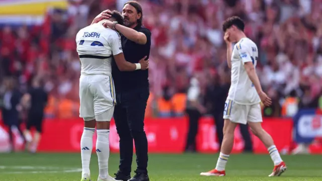 Daniel Farke the head coach / manager of Leeds United consoles Mateo Joseph