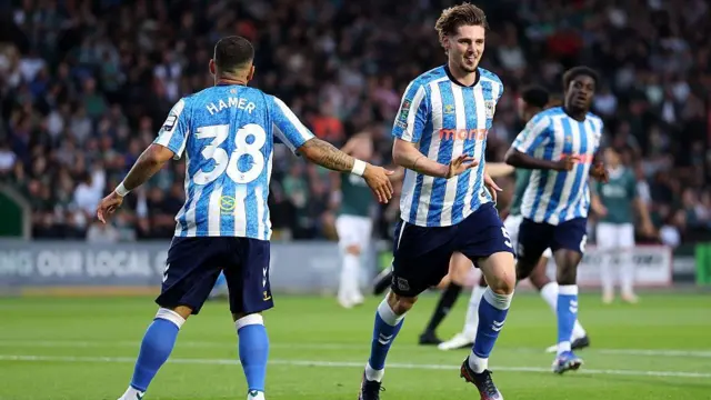 Jack Rudoni celebrates scoring
