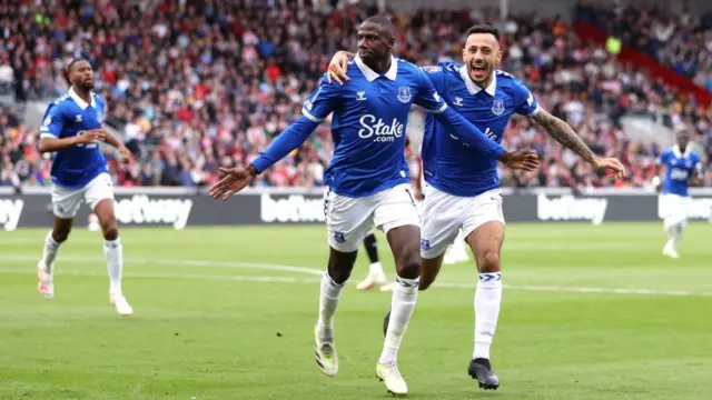 Abdoulaye Doucoure celebrates scoring for Everton against Brentford with team-mate Dwight McNeil