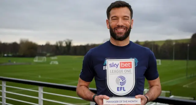 Brian Barry-Murphy with the manager of the month trophy